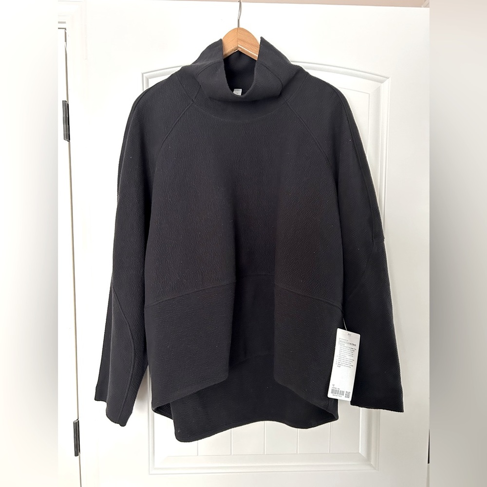Brand new, tags attached Black Lululemon funnel neck pullover.